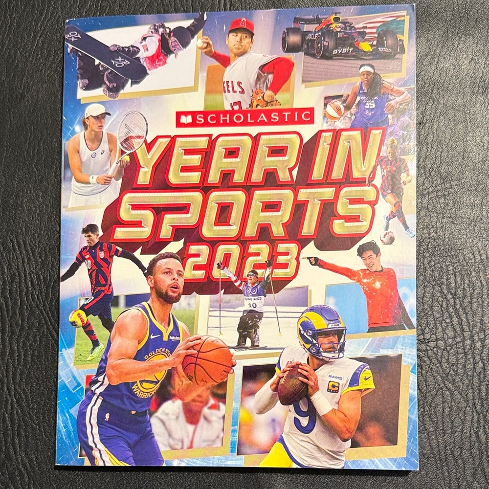 NEW Scholastic Year in Sports 2023 - Dynamic Red and Blue Cover